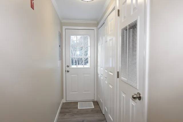 a bathroom with a toilet and shower