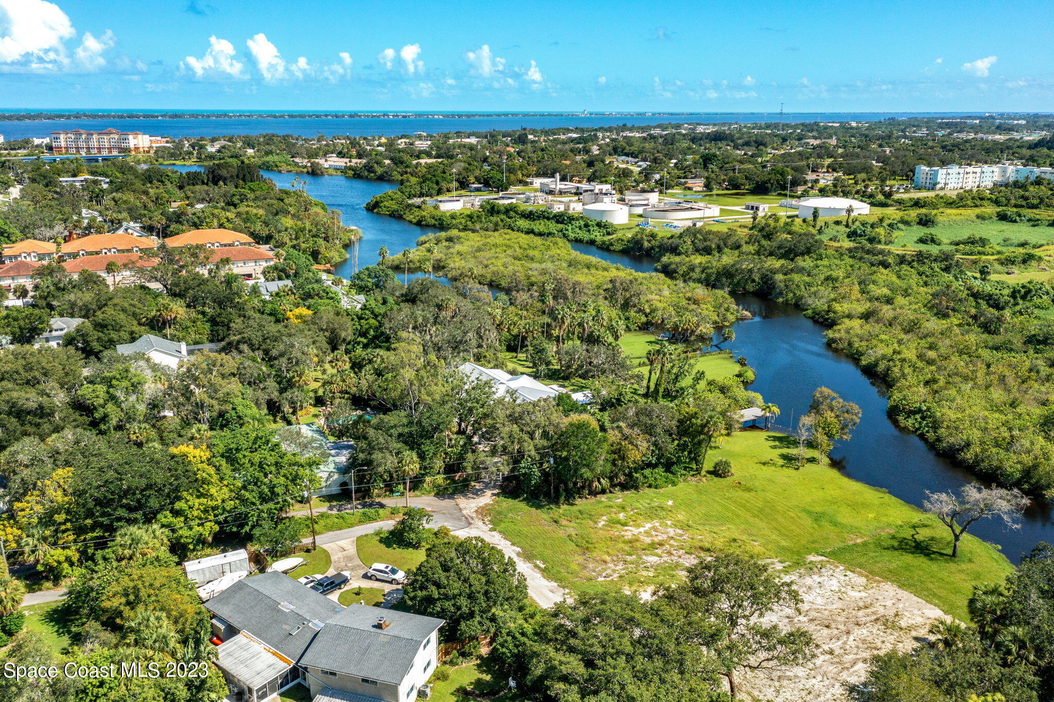 409 Roxy Avenue Melbourne, FL 32901 - Photo 20 of 31 a view of a lake with a city