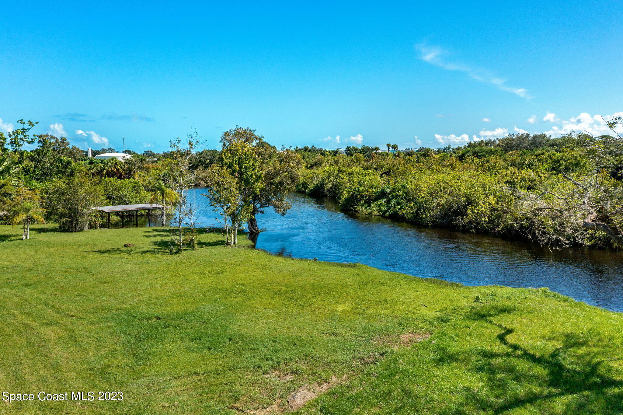 409 Roxy Avenue Melbourne, FL 32901 - Photo 5 of 31 a view of a lake with houses
