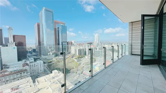 a view of a balcony with city view