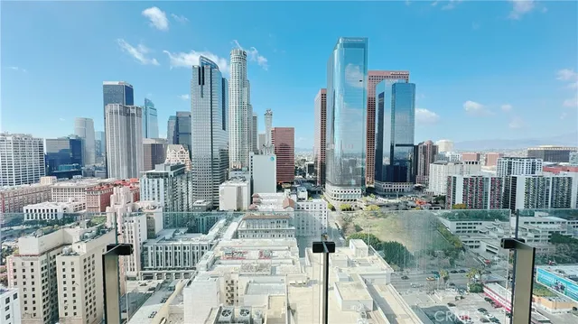 a view of city with tall buildings