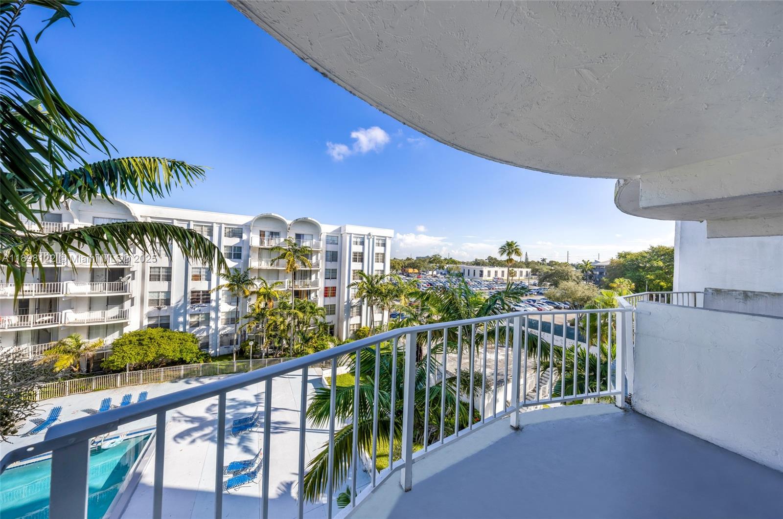 492 Northwest 165th Street, Unit C512 Miami, FL 33169 - Photo 2 of 27 a view of a city from a balcony