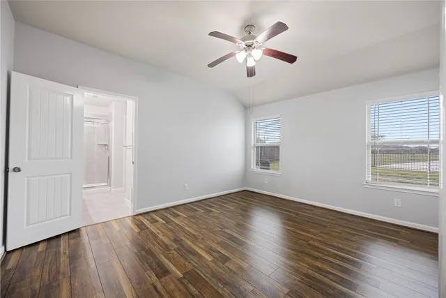 a bathroom with a double vanity sink mirror and shower