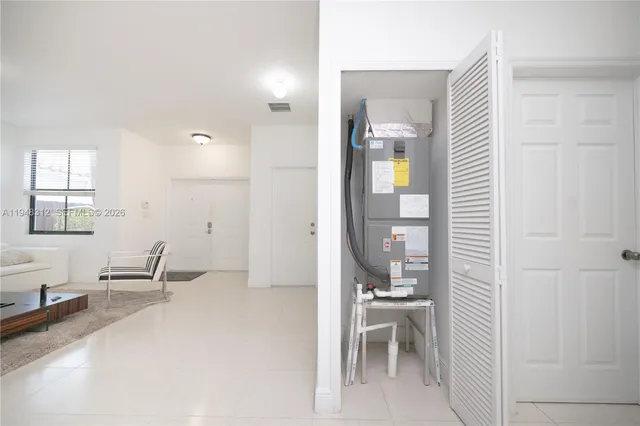 a kitchen with stainless steel appliances a refrigerator and a stove