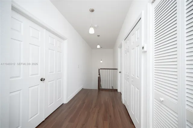 a workspace with furniture and a window