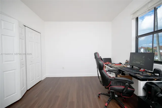 a bathroom with a sink a toilet and bathtub