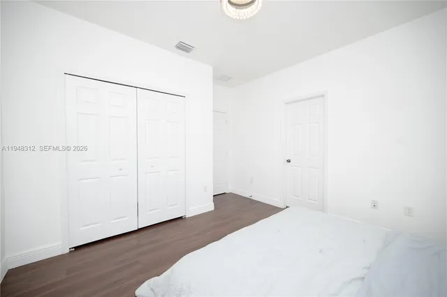 a bathroom with a sink a vanity and a mirror