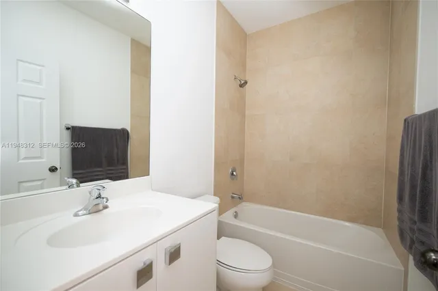 a view of a back yard with green space