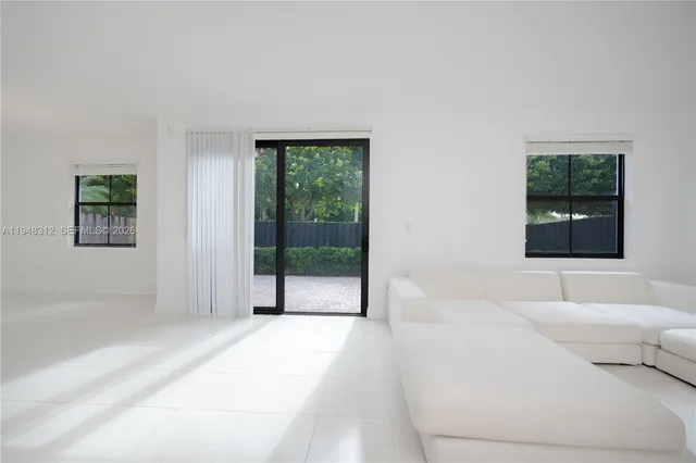 a view of a living room and dining room