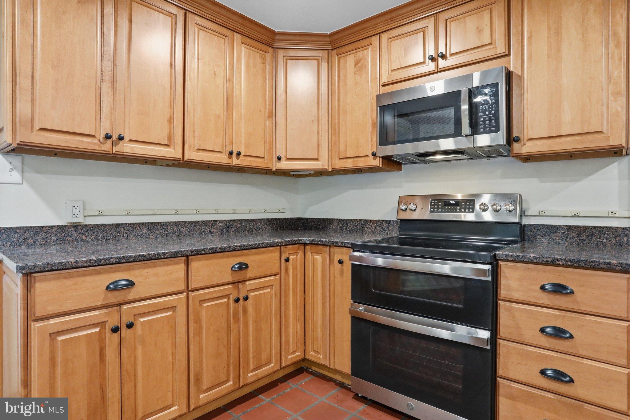 8805 Reichard Road Fairplay, MD 21733 - Photo 36 of 77 Warm wood cabinetry meets modern appliances.