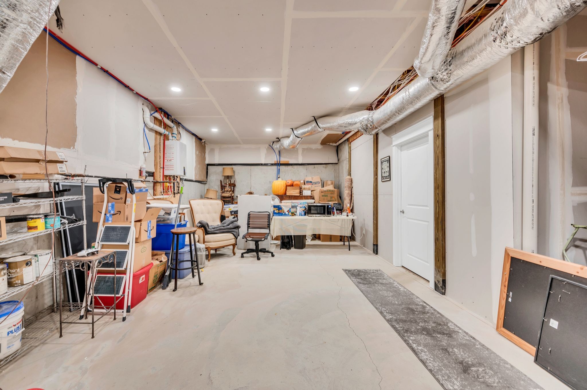 2156 Hartland Road Franklin, TN 37069 - Photo 54 of 63 Incredible storage in the unfinished part of the basement!