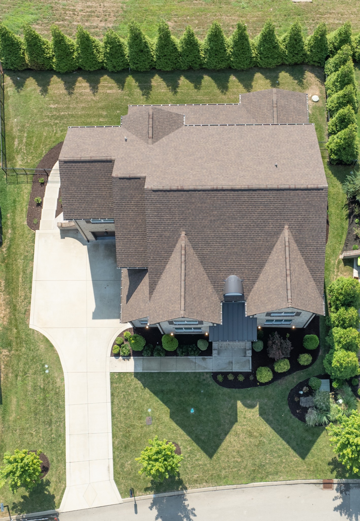 2156 Hartland Road Franklin, TN 37069 - Photo 7 of 63 Mature evergreens on the permitter of the back yard provide privacy