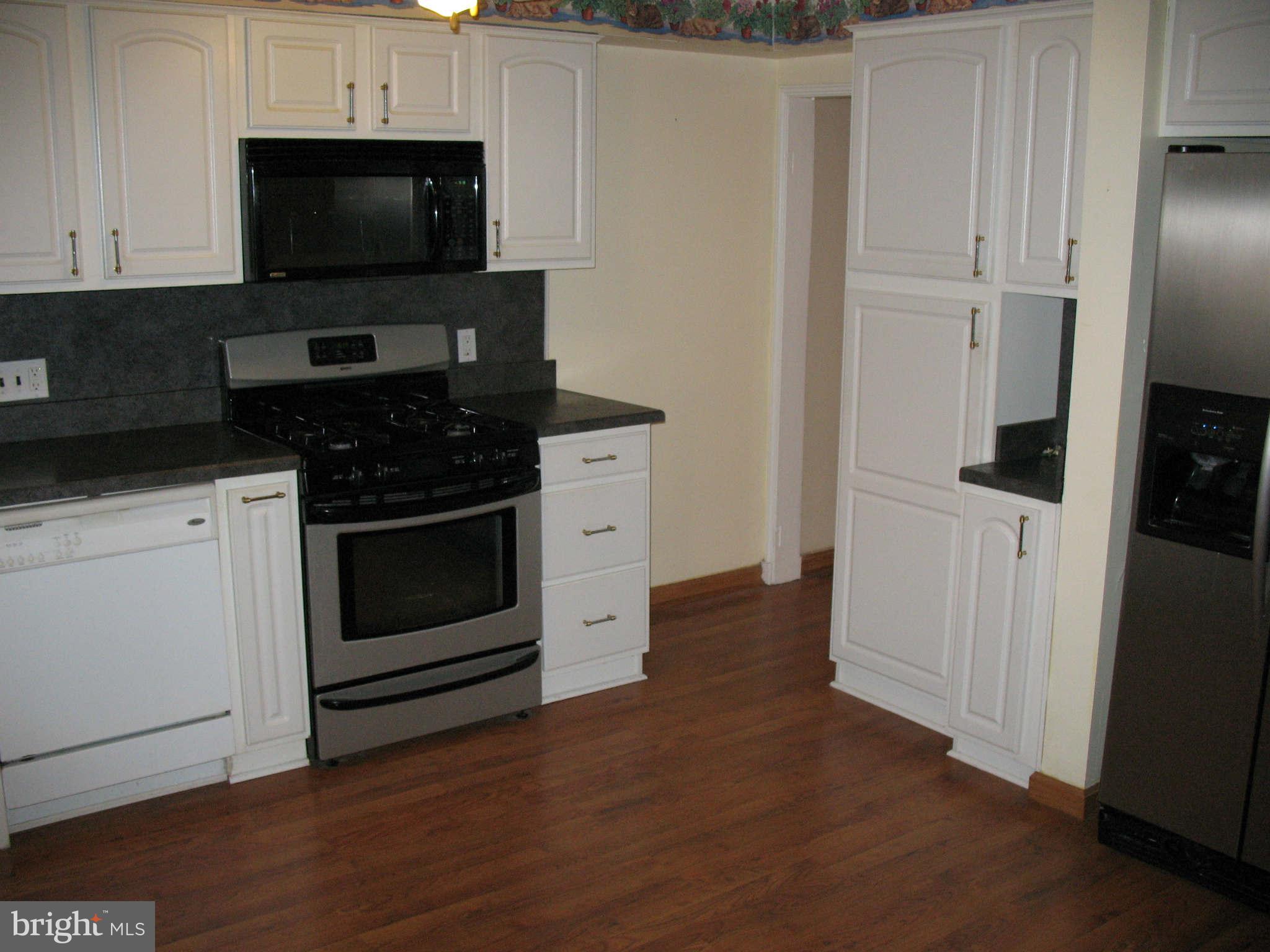 7322 Kirtley Road Baltimore, MD 21224 - Photo 3 of 21 Kitchen w/ S/S appliances