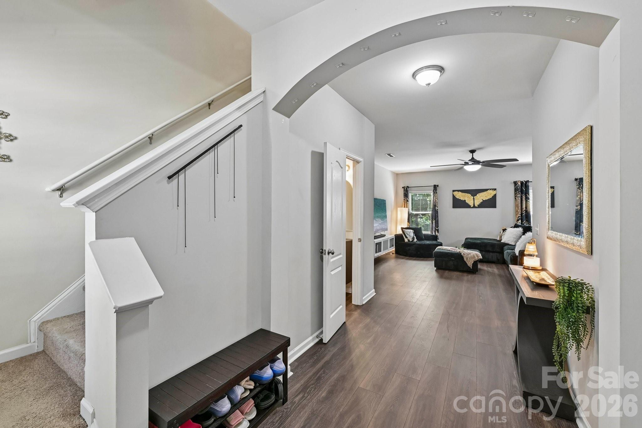 2206 Turtle Point Road Charlotte, NC 28262 - Photo 3 of 28 a view of living room and dining room with wooden floor