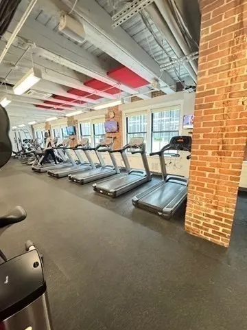 a view of swimming pool with outdoor seating