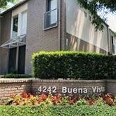 a view of a house with a garden