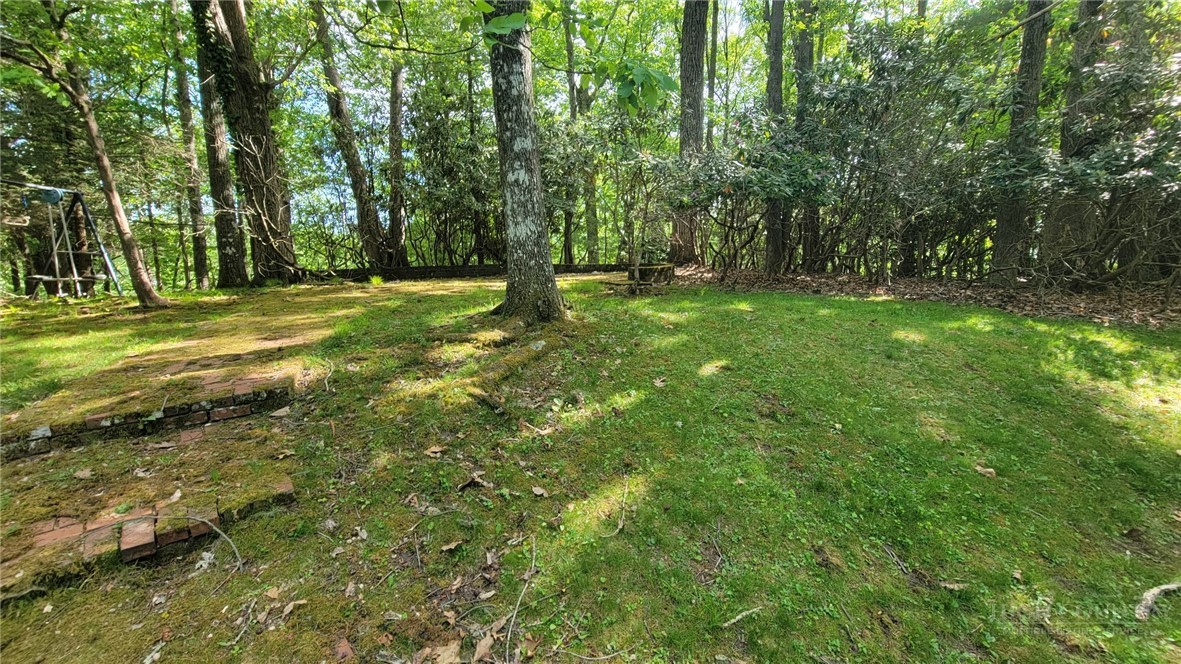 247 Crest Drive Boone, NC 28607 - Photo 19 of 19 a view of outdoor space with deck and yard