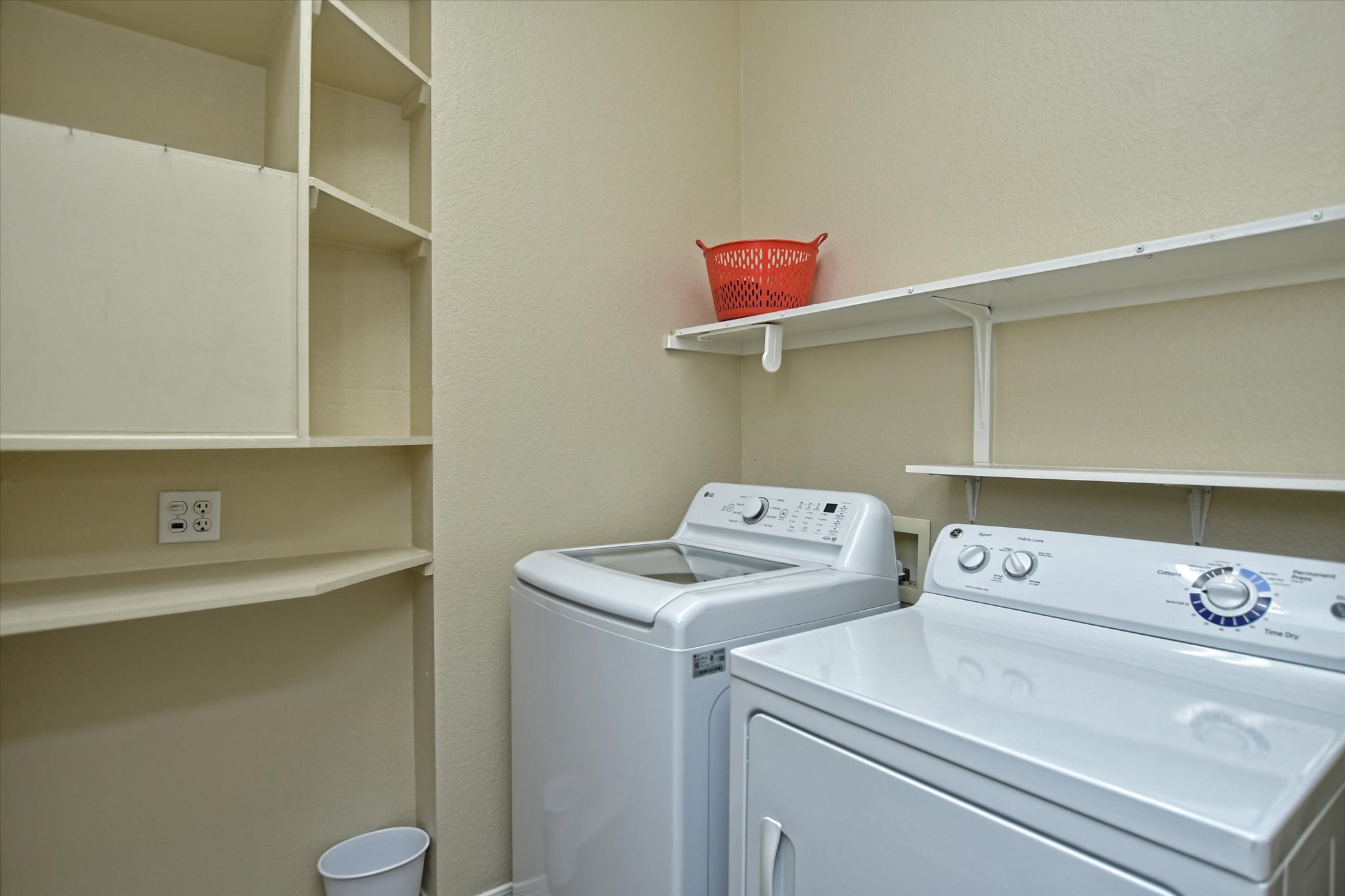 121 Buttercup Trail Georgetown, TX 78633 - Photo 12 of 31 Separate enclosed laundry room with built-in shelves and coat closet.
