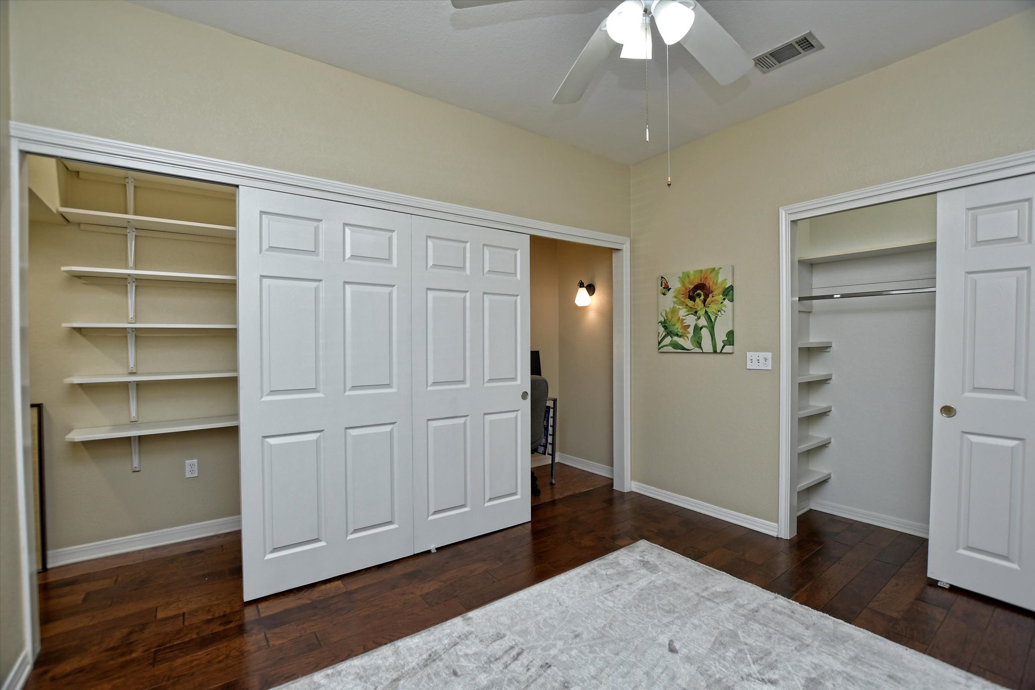 121 Buttercup Trail Georgetown, TX 78633 - Photo 17 of 31 The original closet is still present so there are three full sized closets in total. Lights in all three.