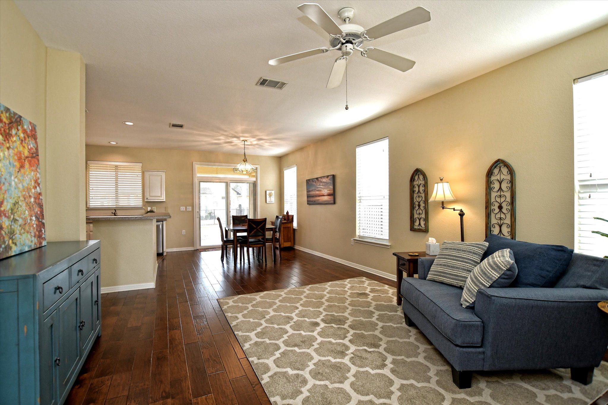 121 Buttercup Trail Georgetown, TX 78633 - Photo 5 of 31 View from front entry across living room to dining room and kitchen.