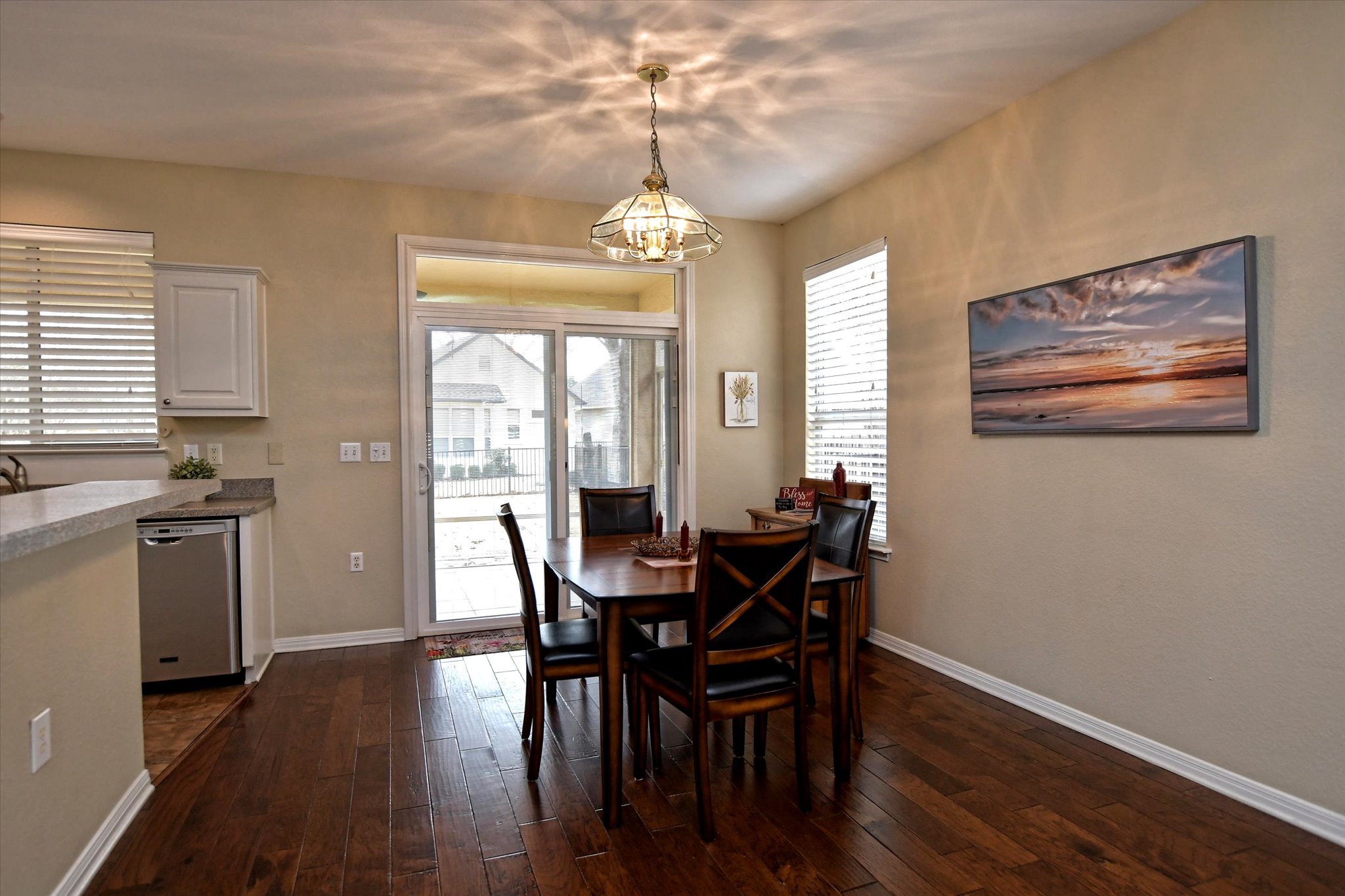 121 Buttercup Trail Georgetown, TX 78633 - Photo 7 of 31 Dining room is open to living area and kitchen with a view through the patio window to the back yard.