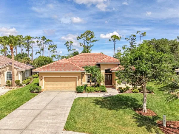 an aerial view of a house with a garden