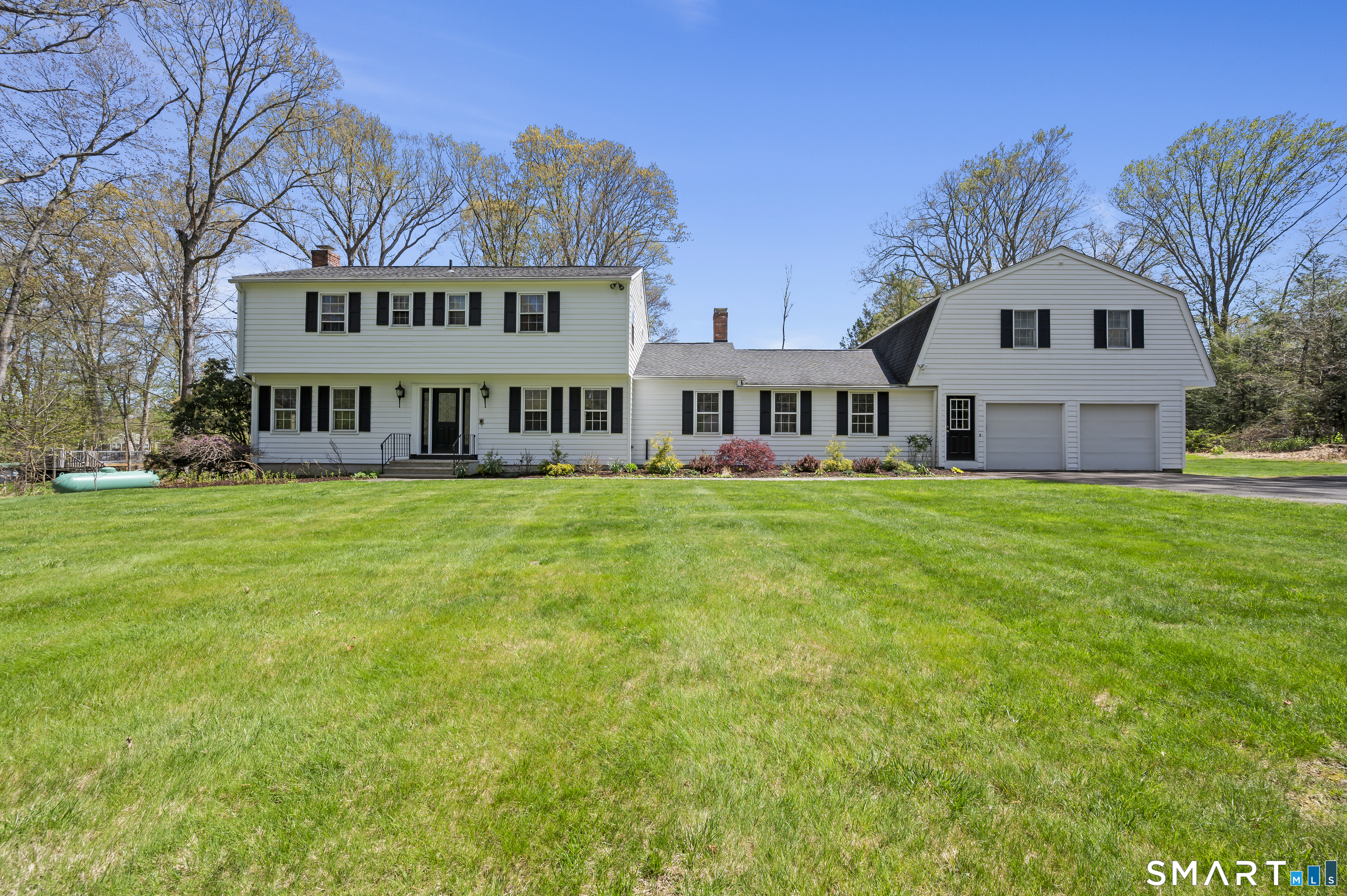 117 Charter Oak Road Southbury, CT 06488 - Photo 1 of 40 a view of a yard in front of house
