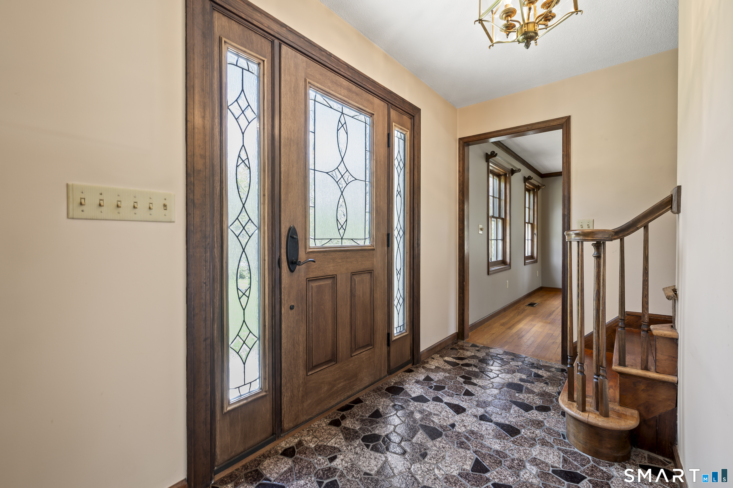 117 Charter Oak Road Southbury, CT 06488 - Photo 16 of 40 a view of a hallway with wooden floor and entryway