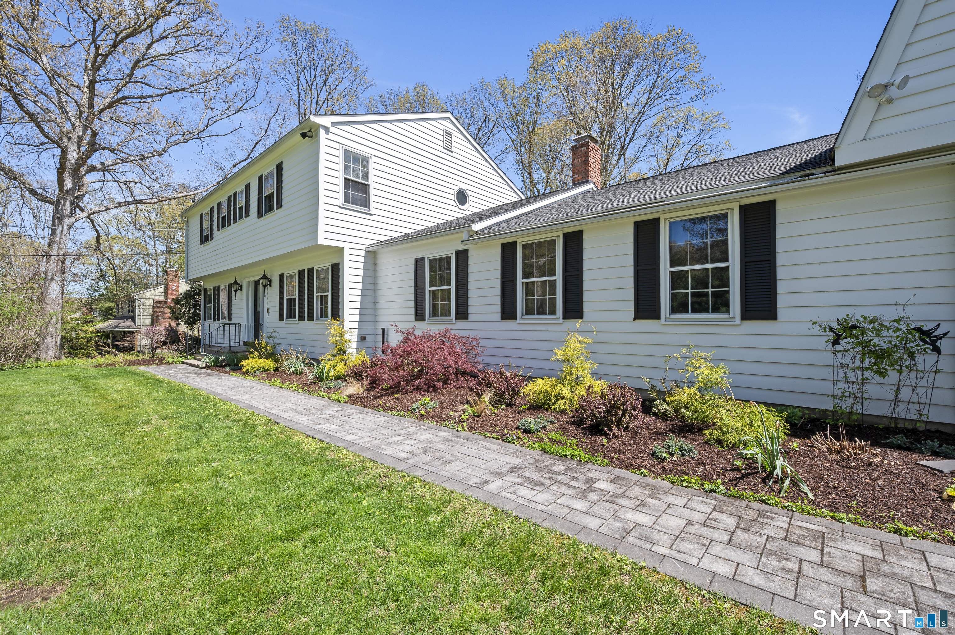 117 Charter Oak Road Southbury, CT 06488 - Photo 2 of 40 a front view of a residential houses with yard and green space