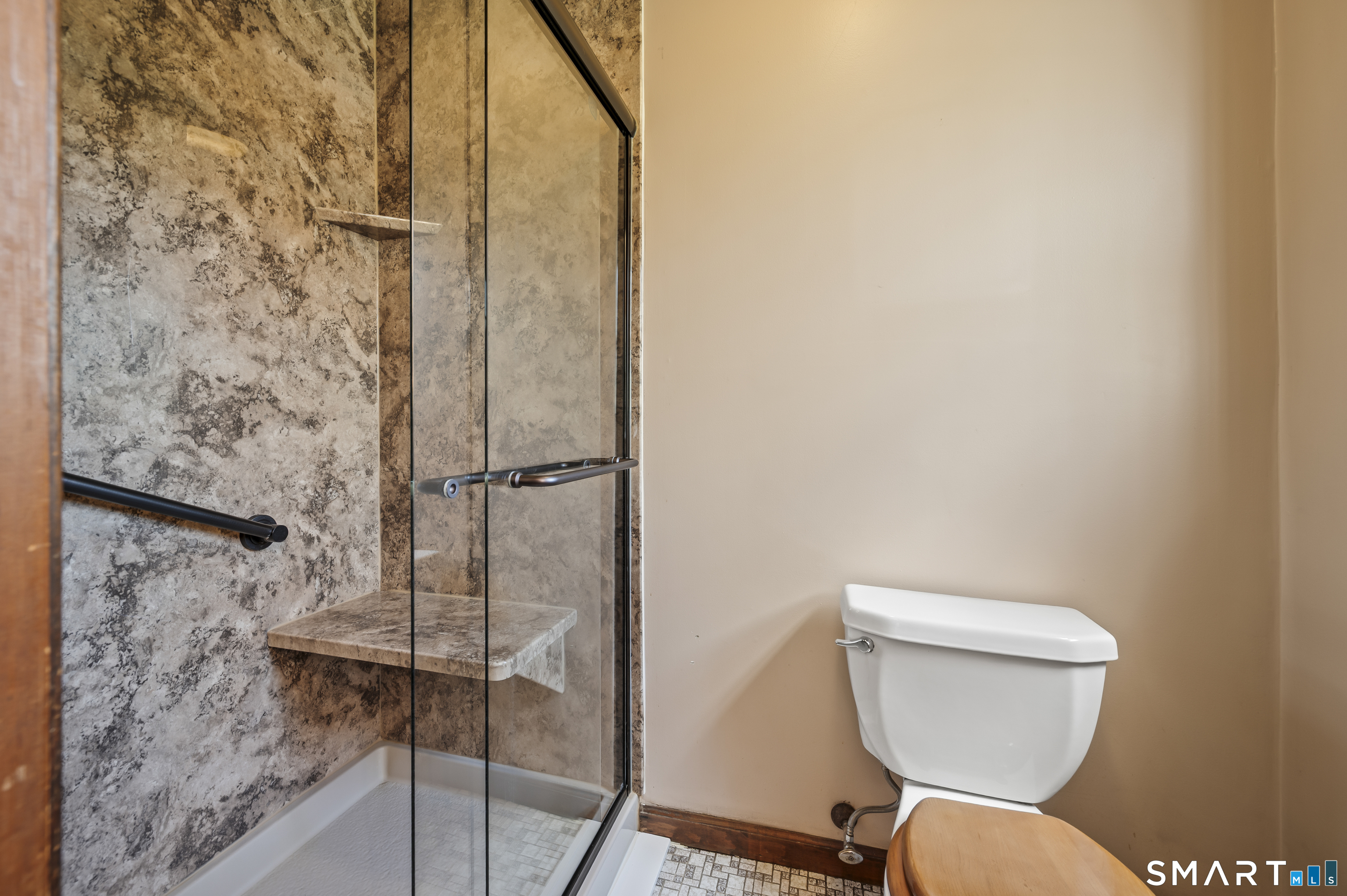 117 Charter Oak Road Southbury, CT 06488 - Photo 26 of 40 a bathroom with a toilet and a shower