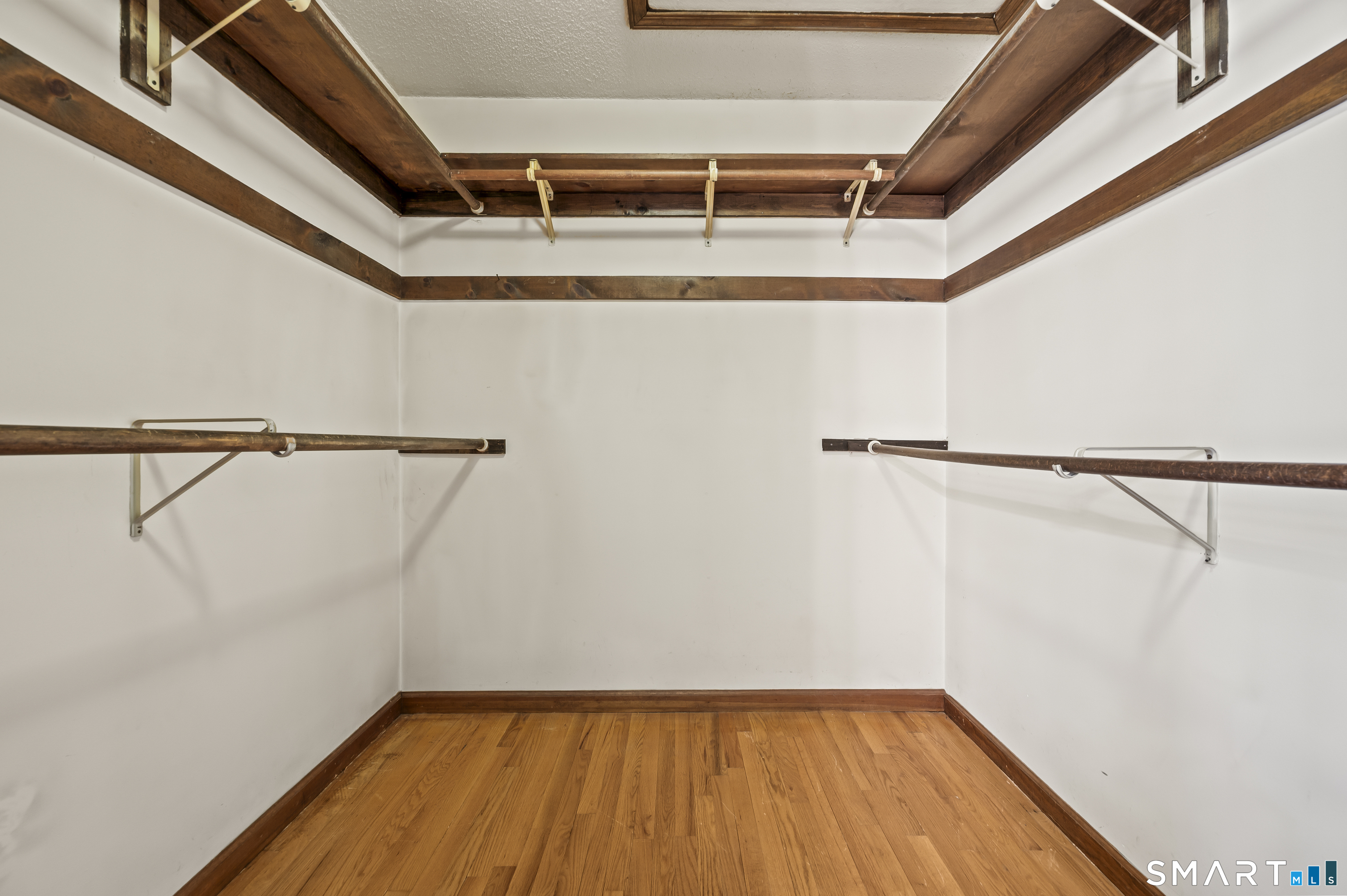 117 Charter Oak Road Southbury, CT 06488 - Photo 27 of 40 a view of a room with racks on the wall