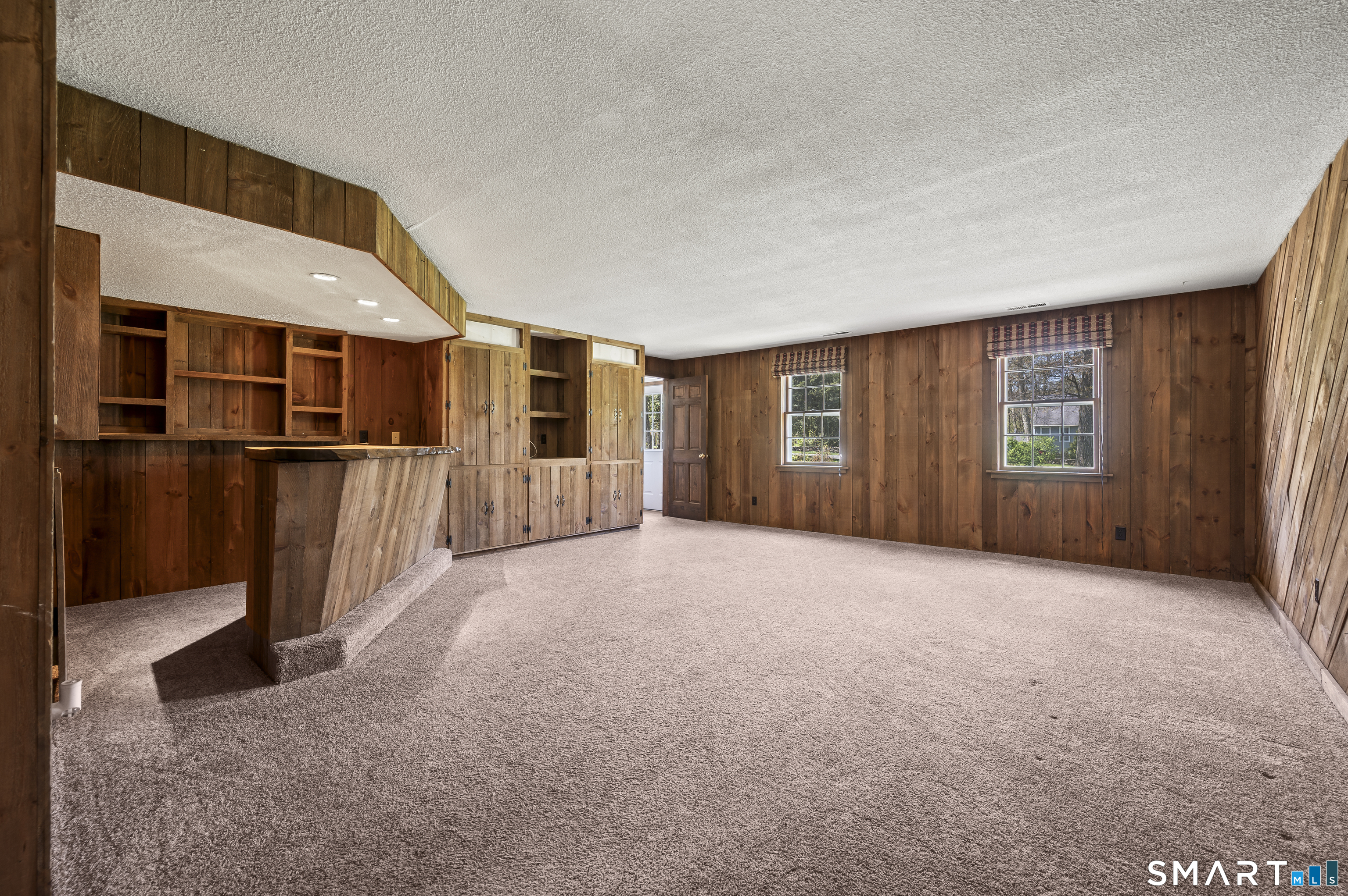 117 Charter Oak Road Southbury, CT 06488 - Photo 4 of 40 a view of a big room with windows