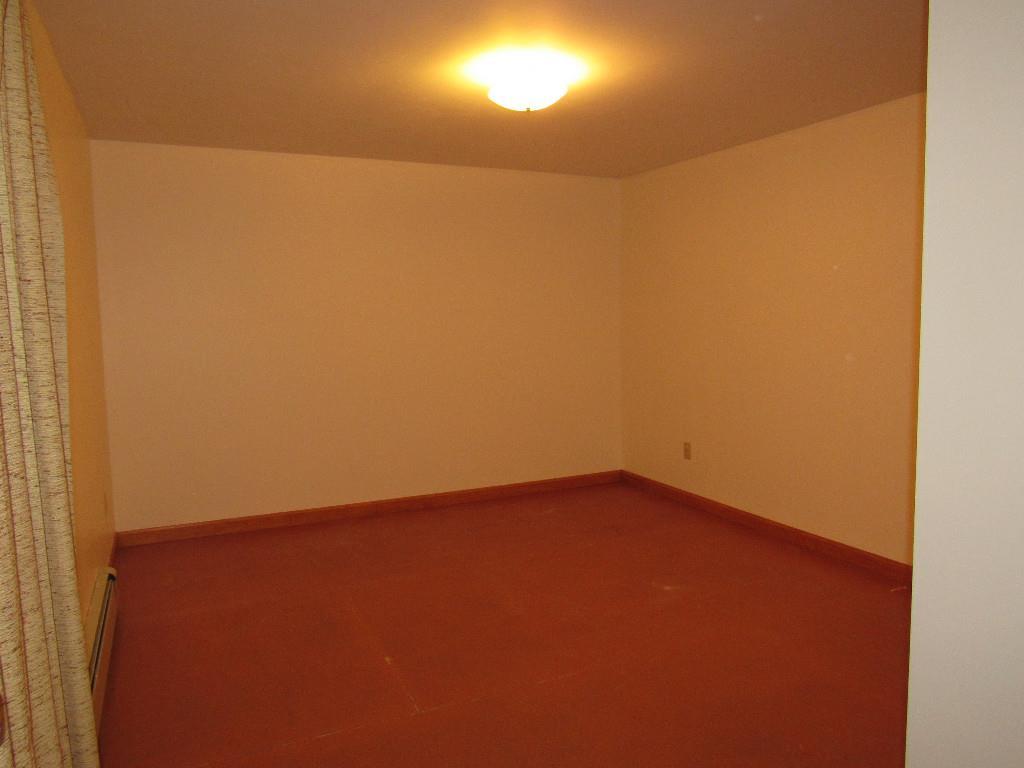 439 Perry Oliver Road Wells, ME 04090 - Photo 11 of 17 1st floor bedroom with closet.