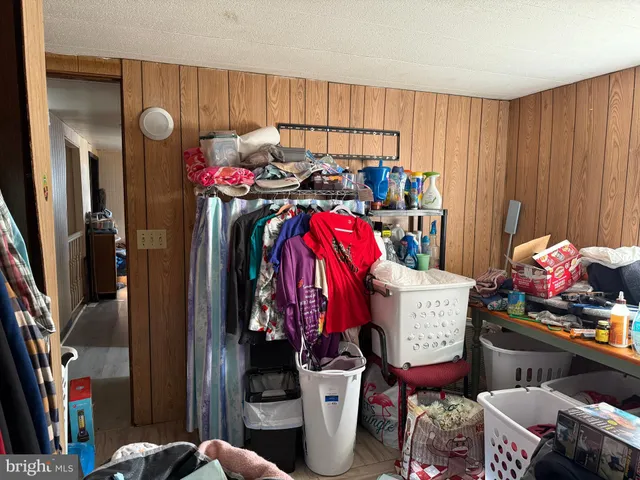 a room with furniture and a flat screen tv