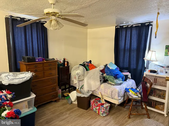 a bathroom with a sink toilet and a mirror