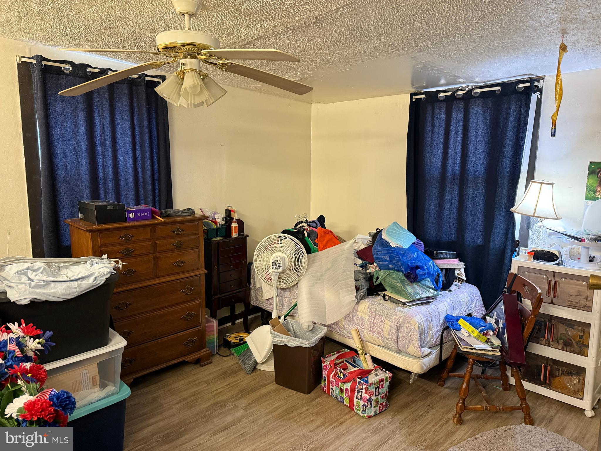 15 Foundry Road Shrewsbury, PA 17361 - Photo 19 of 46 a bedroom with a bed and wooden floor