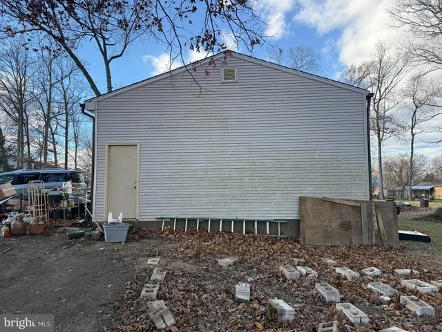 a bathroom with a sink a toilet and a shower