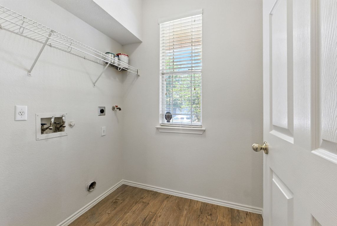 1114 Peyton Place Cedar Park, TX 78613 - Photo 20 of 39 a room with a window and a ceiling fan