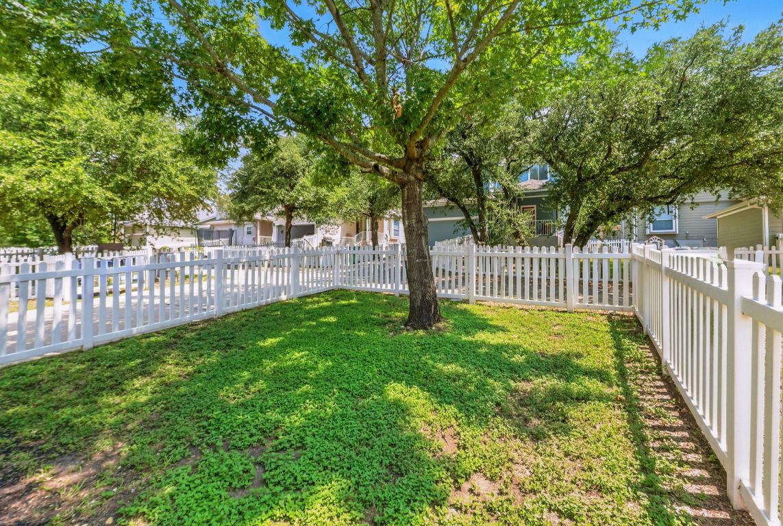1114 Peyton Place Cedar Park, TX 78613 - Photo 30 of 39 a view of a yard with wooden fence
