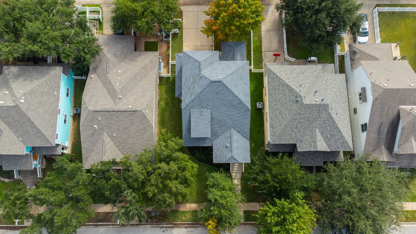 1114 Peyton Place Cedar Park, TX 78613 - Photo 33 of 39 an aerial view of a house with plants and large trees