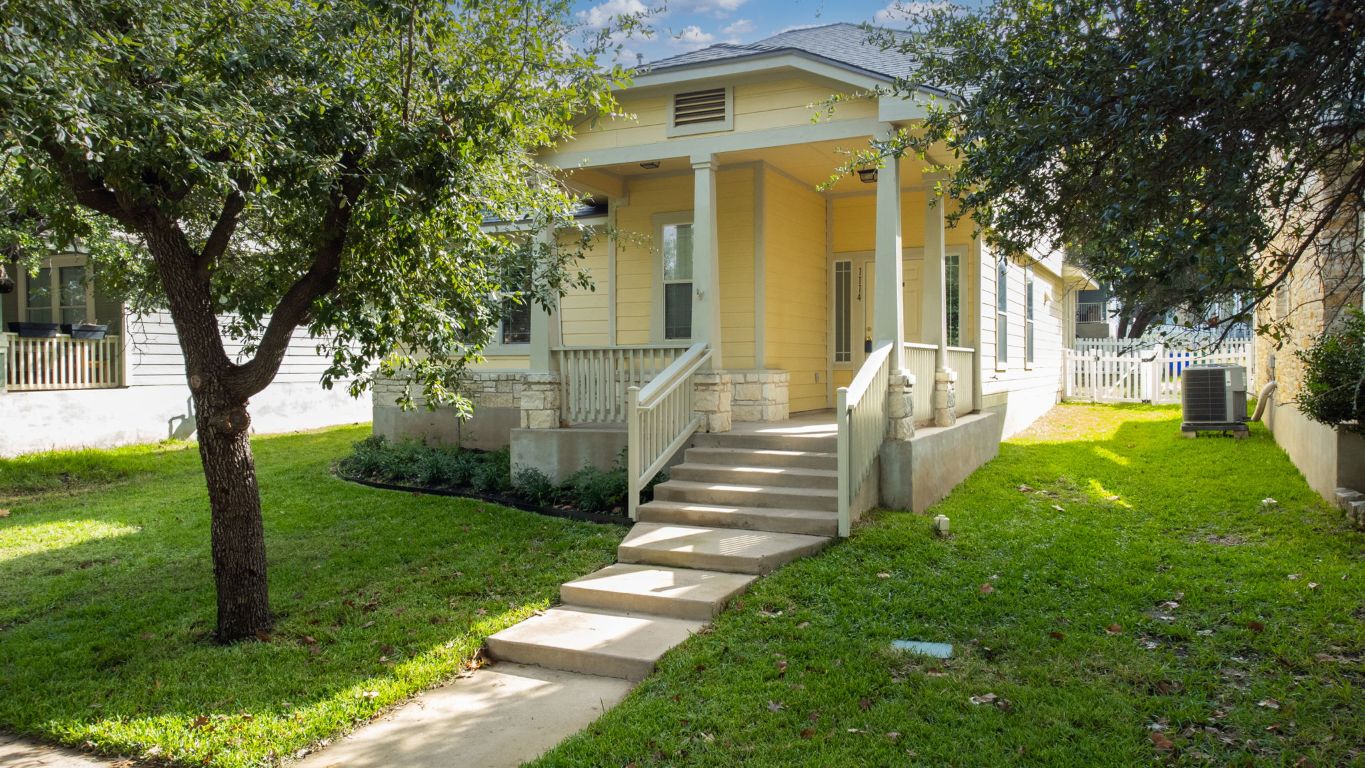1114 Peyton Place Cedar Park, TX 78613 - Photo 5 of 39 a view of a yard with plants and a fountain