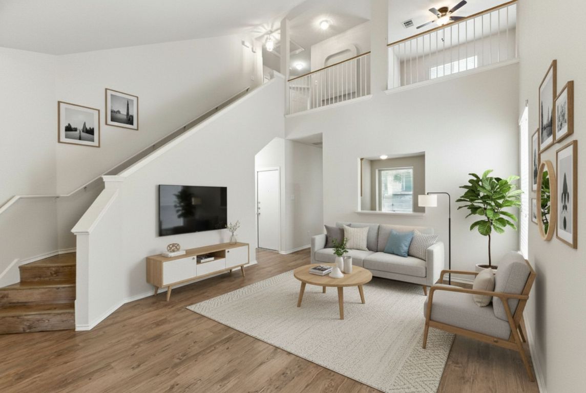1114 Peyton Place Cedar Park, TX 78613 - Photo 7 of 39 a living room with furniture and a flat screen tv