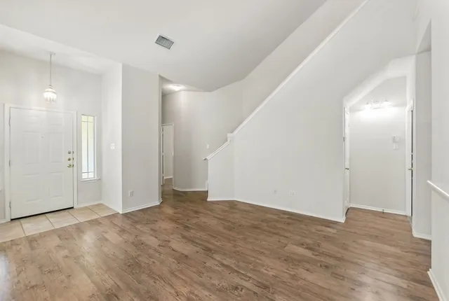 an empty room with a window