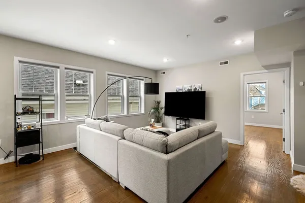 a bedroom with bed and a window