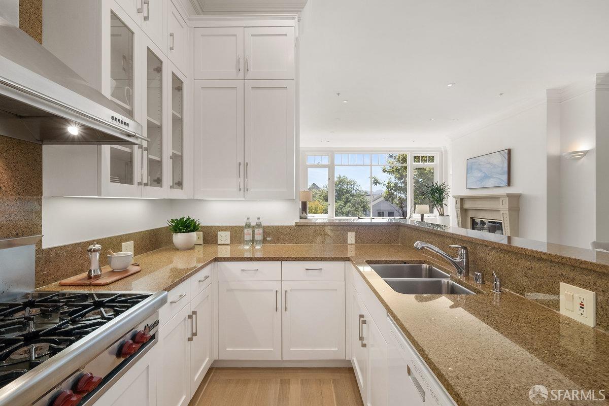 2961 Pacific Avenue San Francisco, CA 94115 - Photo 16 of 64 a kitchen that has a sink and a stove