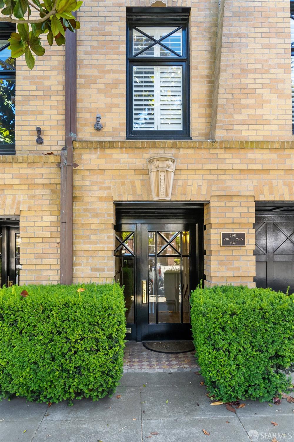 2961 Pacific Avenue San Francisco, CA 94115 - Photo 64 of 64 front view of a house with a small yard