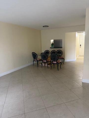 21911 Lake Forest Circle, Unit 201 Boca Raton, FL 33433 - Photo 3 of 8 a view of a livingroom with furniture