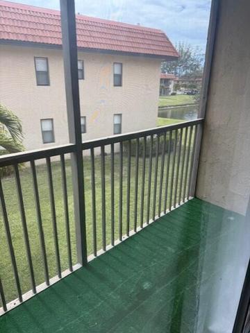 21911 Lake Forest Circle, Unit 201 Boca Raton, FL 33433 - Photo 8 of 8 a view of a balcony