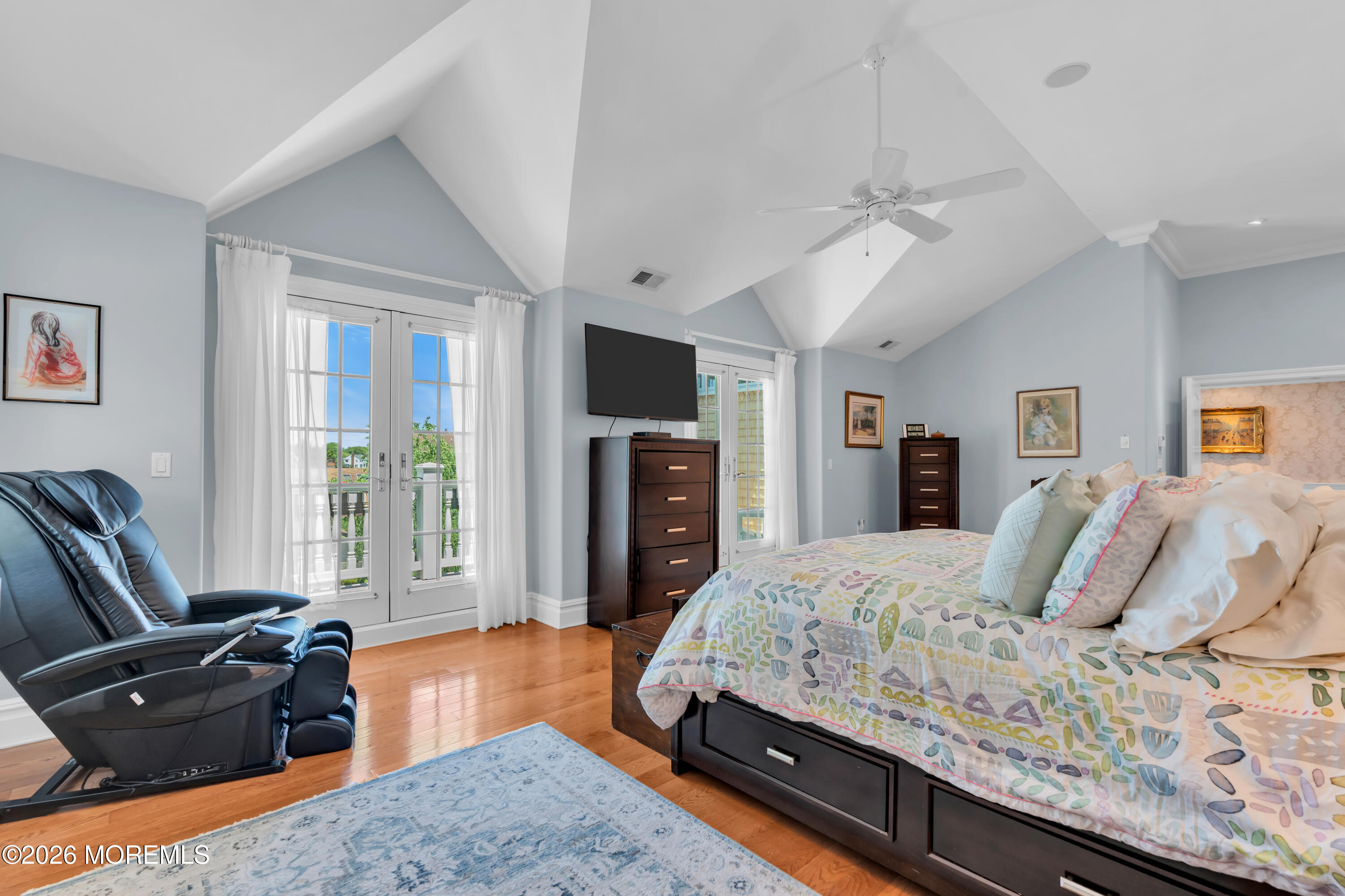 600 Little Silver Point Road Little Silver, NJ 07739 - Photo 31 of 55 a bedroom with a bed and wooden floor