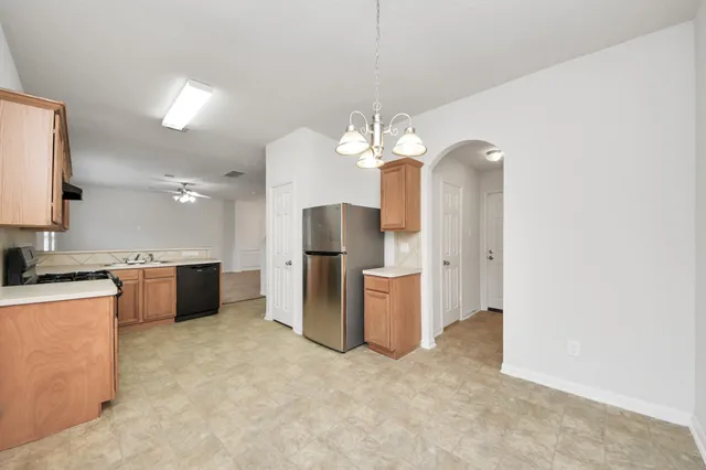 a bathroom with a sink a mirror and a shower